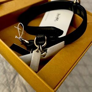 Coach black leather dog collar. Size small. Brand new in box.